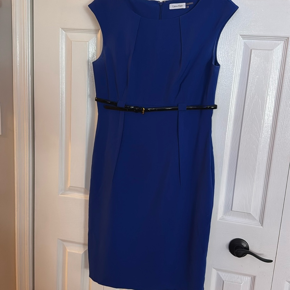 Beautiful blue pleated dress with black belt